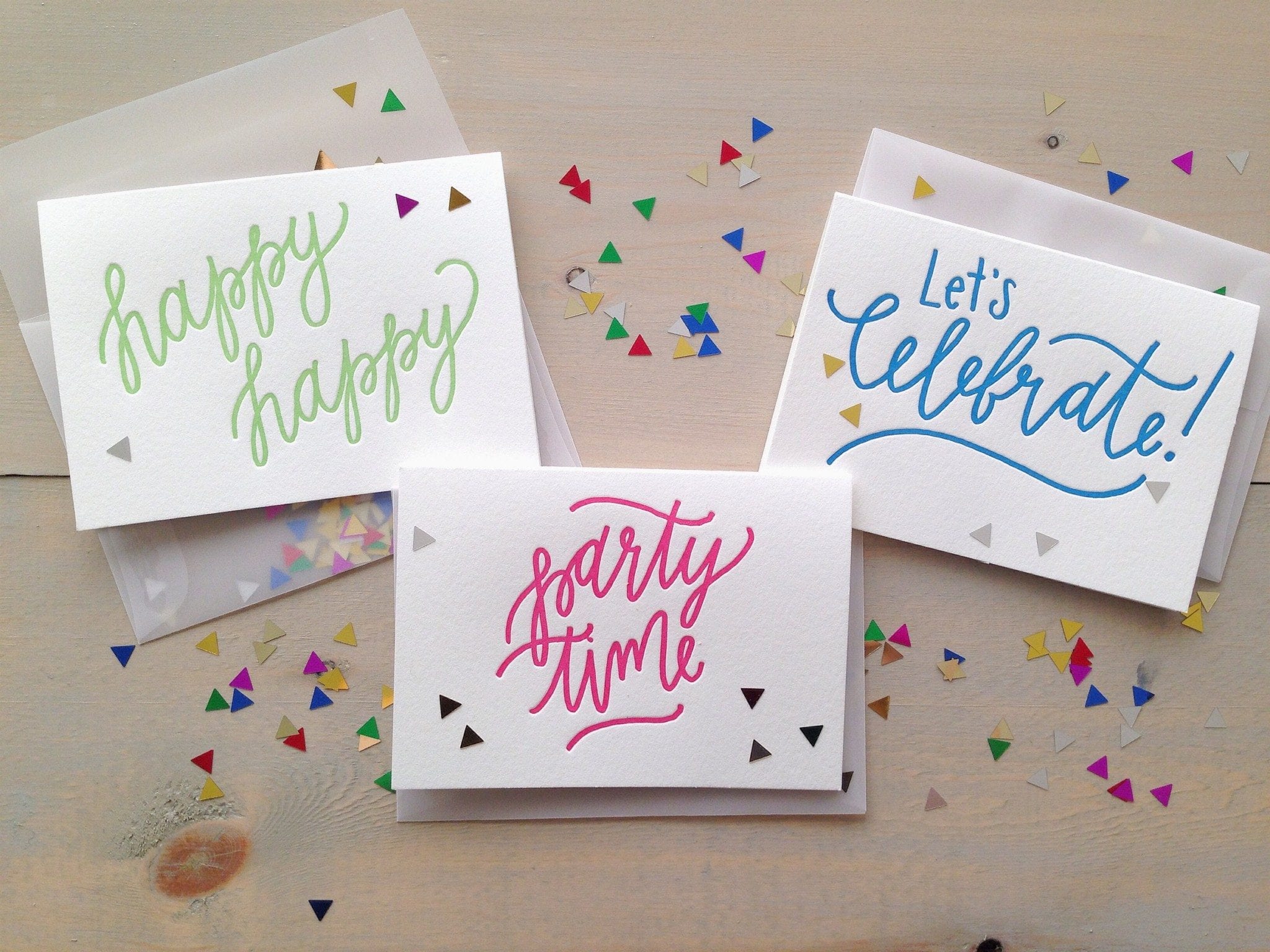 party and celebration greeting cards paired with a vellum envelope and scoop of triangle confetti