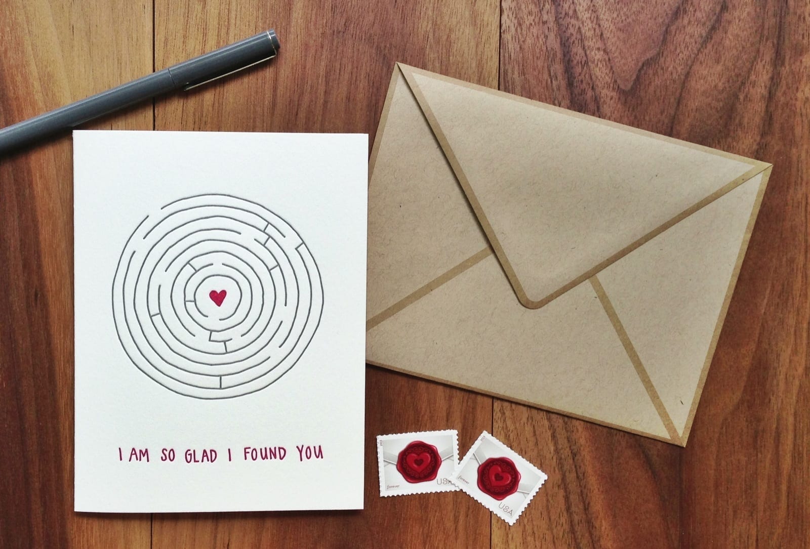 Letterpress printed greeting card with maze on front, paired with a kraft envelope