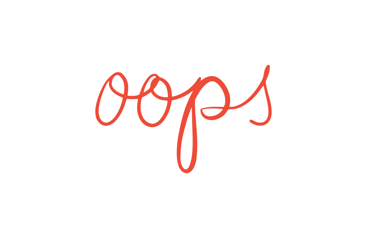the word "oops" hand lettered in red ink