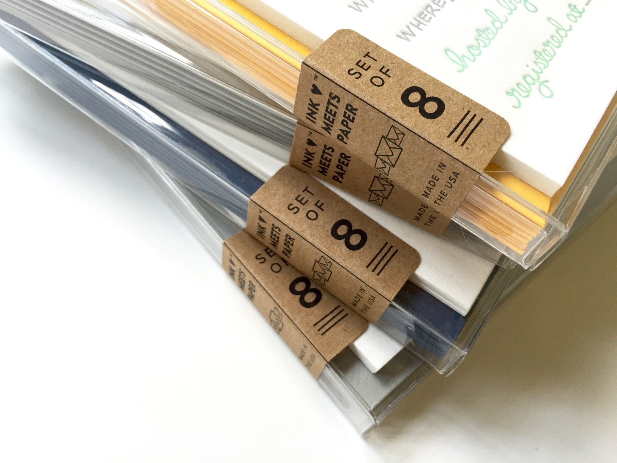 Stack of Fill-in Invitation Sets showing side detail of paper label