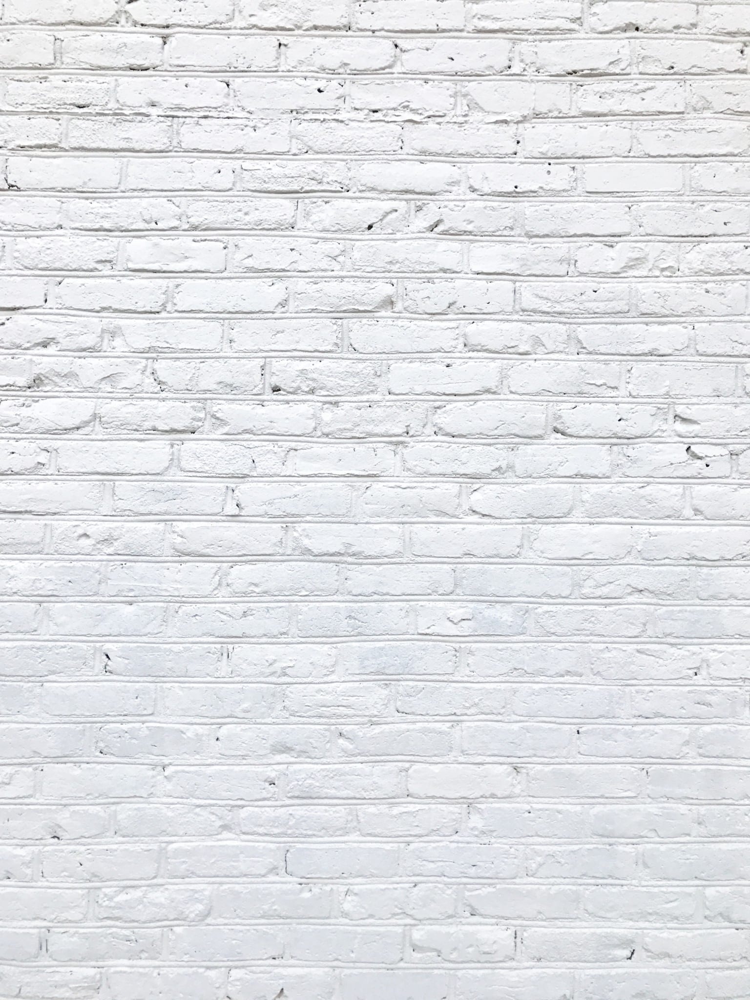 Brick wall painted white