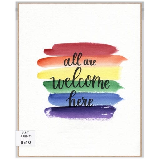8x10 art print. Handlettered words "All Are Welcome Here" over a unique watercolor rainbow background