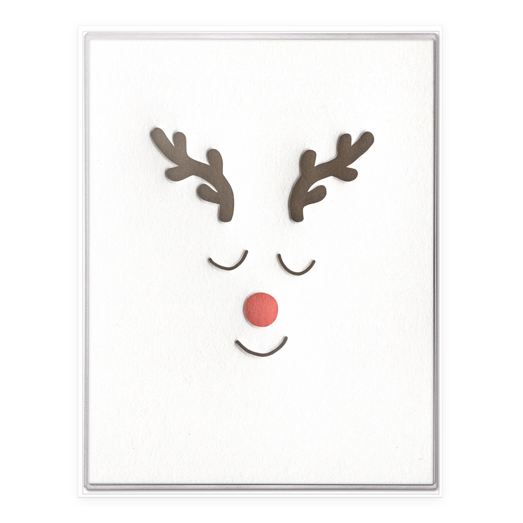 Boxed set of six Christmas cards featuring a minimalist letterpress reindeer face with brown antlers and red nose.